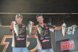 Nicholas Schuetz and Elliott Myers show off their 11-pound, 6-ounce bag on the final day. 