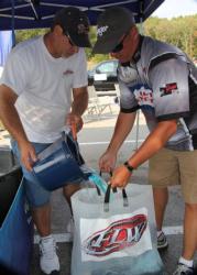 Top pro Robbie Dodson gets some fresh water on his fish.