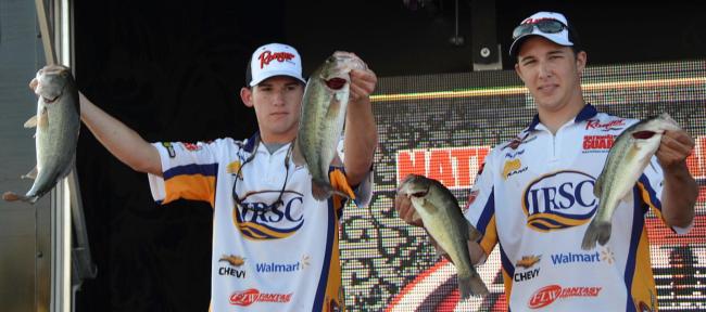 Indian River State College anglers Kyle Monti and Mike Cornell hold up part of their 11-pound, 11-ounce limit.