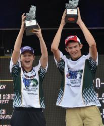 Chelsey Queen and Kristopher Queen celebrate after winning the High School Fishing Southeastern Conference Championship on Lake Wylie.