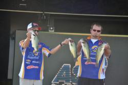 The team from Angelo State of Ethan George and Josh Seale show off their 12-pound, 8-ounce bag from day one of the National Guard FLW College Fishing Southern Conference Championship.  