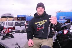 With an EverStart trophy sitting on his snow-dusted deck, James McMullen shows off his winning lures: a Yellow Hammer spinnerbait rig with Keitech swimbaits.