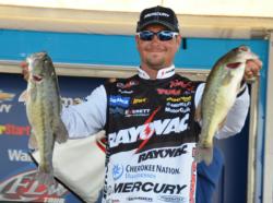 Jason Christie caught a 14-pound, 7-ounce stringer Sunday and rose from 10th to fourth, earning $25,000. 