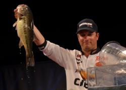 Third-place finisher Anthony Gagliardi holds up his biggest bass from day four on Beaver Lake. 