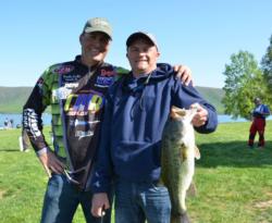 Dennis Burdette of Lindside, W.V., poses with his pro on day one Brandon Coulter who helped put him on his 13-pound, 15-ounce limit. 
