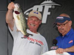 Rick Taylor shows off one of his victory fish.