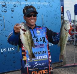 Fifth-place pro Scott Martin stayed shallow and caught an opening-round total of 31 pounds, 15 ounces.