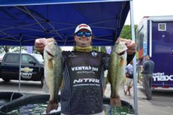 Co-angler Dustin Evans caught 16 pounds, 10 ounces to take third after day one. 