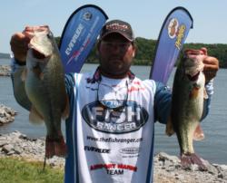 Clent Davis  stays in third place with a combined catch of 40 pounds, 10 ounces.