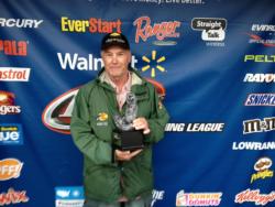 Co-angler Carl Hemken of Walshville, Ill., won the June 22 Illini Division event on Lake Shelbyville with four bass that weighed 14 pounds, 4 ounces. He was awarded a check worth over $2,000 for his victory. 