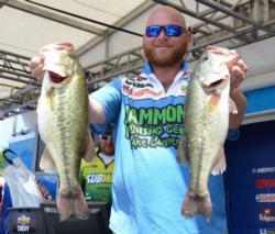 Co-angler Jason Johnson of Gainesville, Ga., takes the lead after weighing an impressive 19 pounds, 8 ounces on day one.