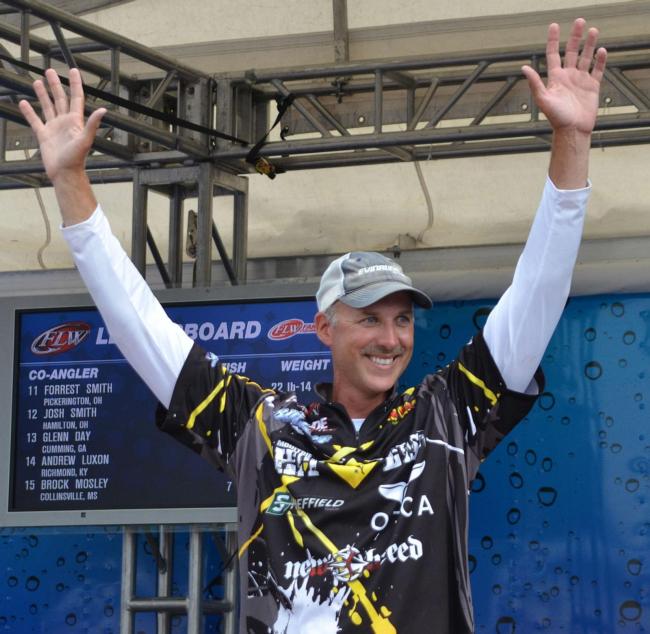 Andy Morgan celebrates after learning he won the 2013 Angler of the Year award.