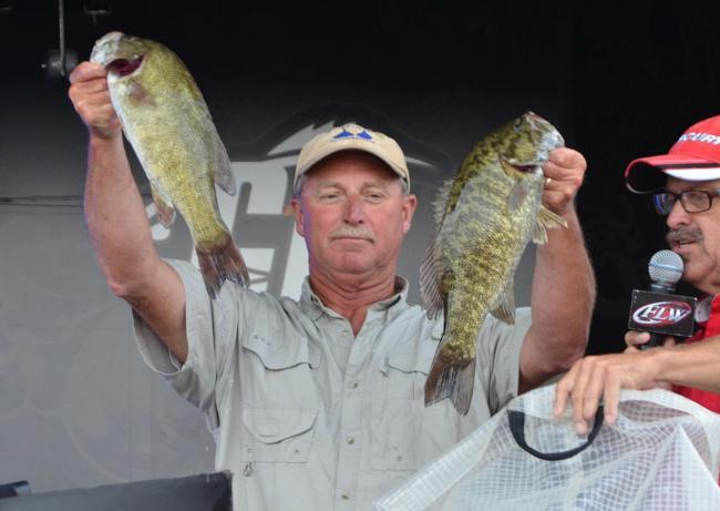 Rick Taylor retained second place after catching a 14-pound, 4-ounce limit Saturday.