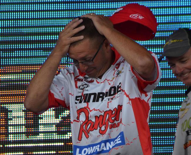 Michael Sitko reacts after learning he won the EverStart Series Central Division event on the Detroit River.