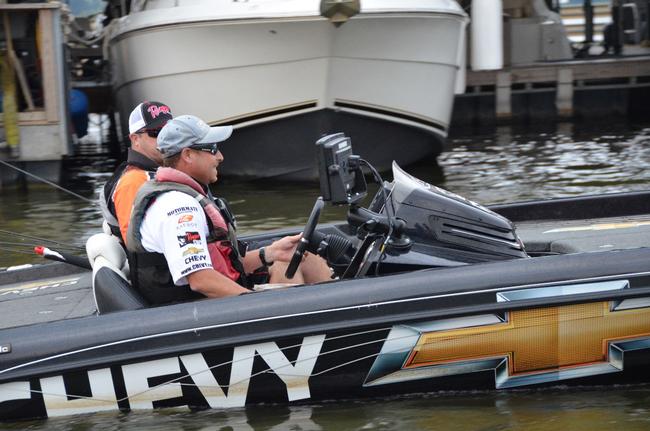 Chevy pro Bryan Thrift departs the marina as Forrest Wood Cup competition on the Red River commences.