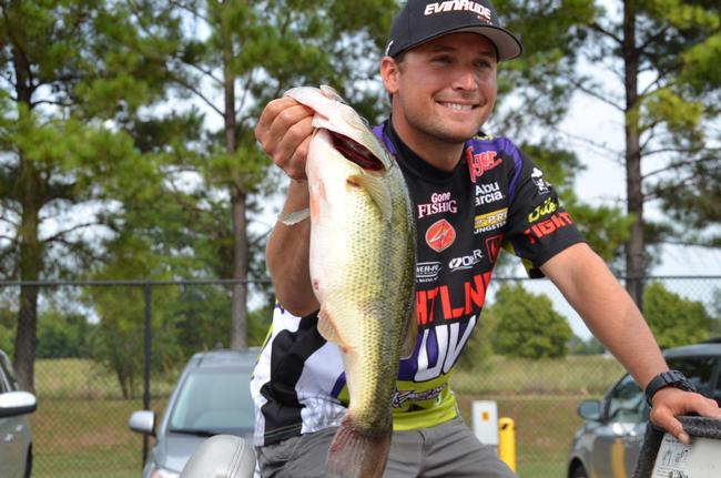 Justin Lucas shows off his 10th-place catch.