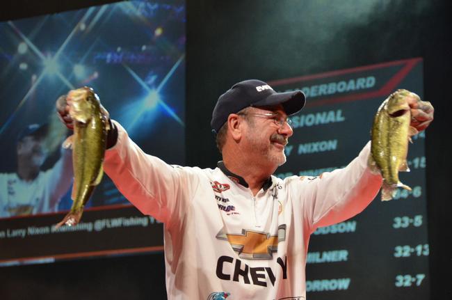 Chevy pro Larry Nixon holds up his catch. Nixon qualified for the finals of the 2013 Forrest Wood Cup in third place. 