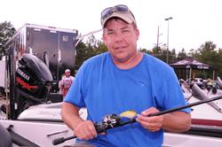 Rayburn winner Jason Wells shows off his winning combo: a Norman DD-22 on 12-pound fluorocarbon with a Lew