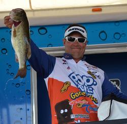 Second-place finisher Greg Bohannan holds up a good Lake Okeechobee largemouth.