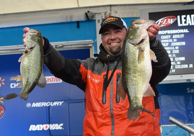 Jason Quinn holds up two Lake Hartwell largemouths that anchored his 18-pound, 9-ounce limit. 