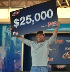 For winning the FLW Tour event on Lake Hartwell, co-angler David Redington earned $25,000. 