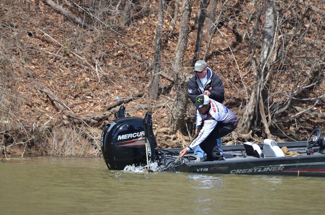 Co-angler Todd Lee battles his first keeper to the boat.