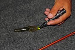  Matt Stasiak adds scented chartreuse dye to his flipping bait.