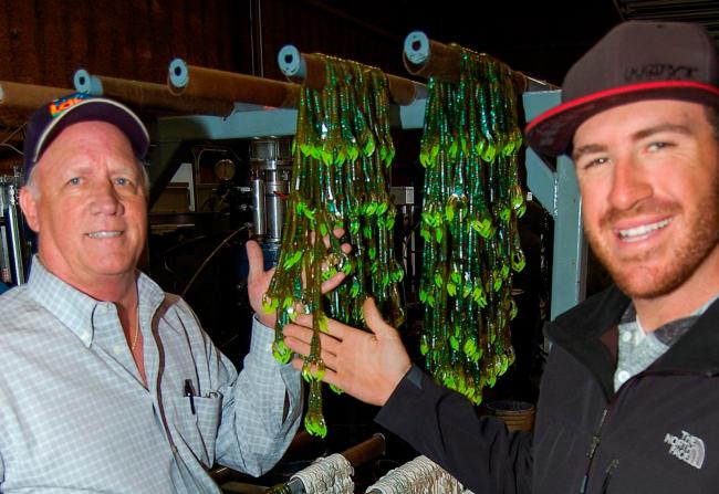 Larew's Chris Lindenberg (left) and pro angler Jacob Wheeler check out Larew's flagship lures, the Salt Craw, fresh out of the mold at the company's headquarters in Tulsa, Okla. 