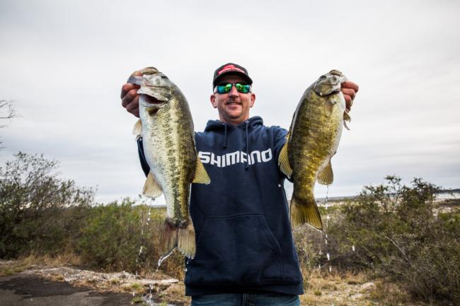 Local guide Ray Hanselman was on them today. He landed two limits worth of keepers and is poised to make a run at Brauer's lead on Friday. Oh, and check out the smallie.