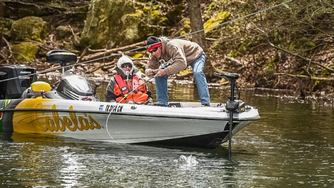 Clark Wendlandt doing everything he can to make sure this is not the one that got away on day three of the Walmart FLW Tour on Lewis Smith Lake.