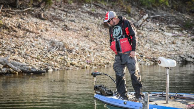 Walmart pro David Dudley inspecting some beds on day one of the FLW Tour on Beaver Lake.
