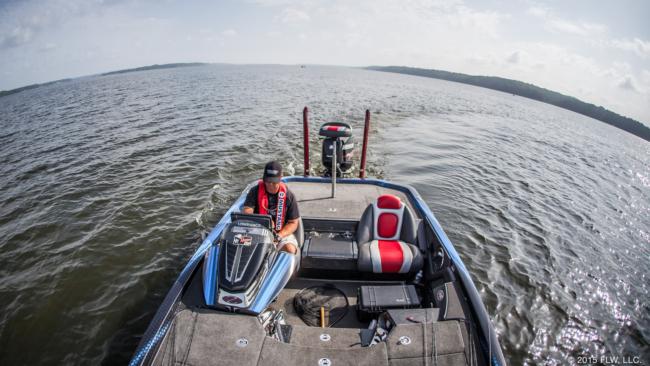 Time to idle. Batts scanned some offshore ledges, but he primarily concentrated on checking bush piles that he had fished previously. He re-marked them when necessary and put a second waypoint down nearby to mark where he needed to position his boat to cast in it. 