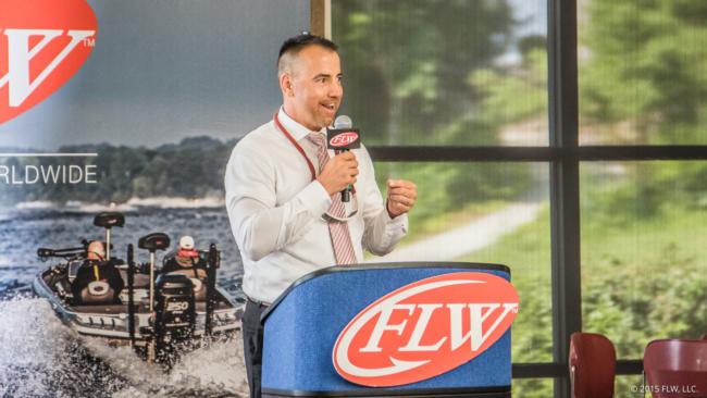 Executive Director of the Rhea County Economic and Tourism Council Dennis Tumlin addresses the Walmart FLW Tour anglers at Wednesday's registration meeting.