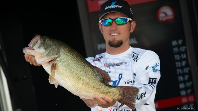 Second place pro Stetson Blaylock shows off the giant that anchored his 24-1 catch on the final day. 