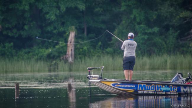 John Cox slings a cast during the final 30 minutes of outgoing tide this morning.