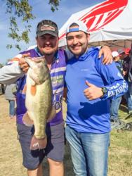 Alfredo Kury holds up the tournament's big bass with FLW Mexico Centro Director Francisco Mayorga Jr.