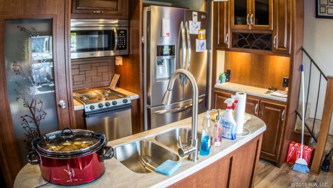 Though you wouldn't want to prepare a Thanksgiving meal in the camper's kitchen, it has everything Becky needs to cook for a family on the road. When we got there, dinner was already preparing in a slow cooker on the counter. 