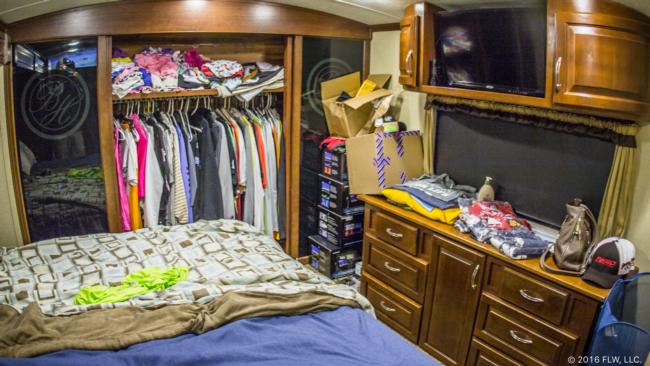 The master bedroom serves as command central, and it was stacked with recently arrived boxes from sponsors and extra hats. As expected, Brad's meticulous organization doesn't just apply to his tackle. His shirts are hung carefully in order from short sleeve to long sleeve.